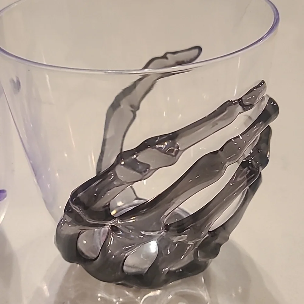 Free With Purchase Skeleton Skull plastic cups.